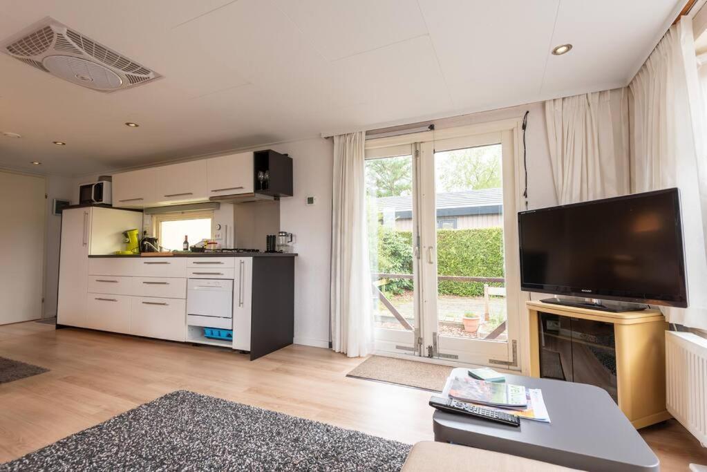 Knus Huisje Op Kindvriendelijk Park Met Zwembad Otterlo Exterior foto